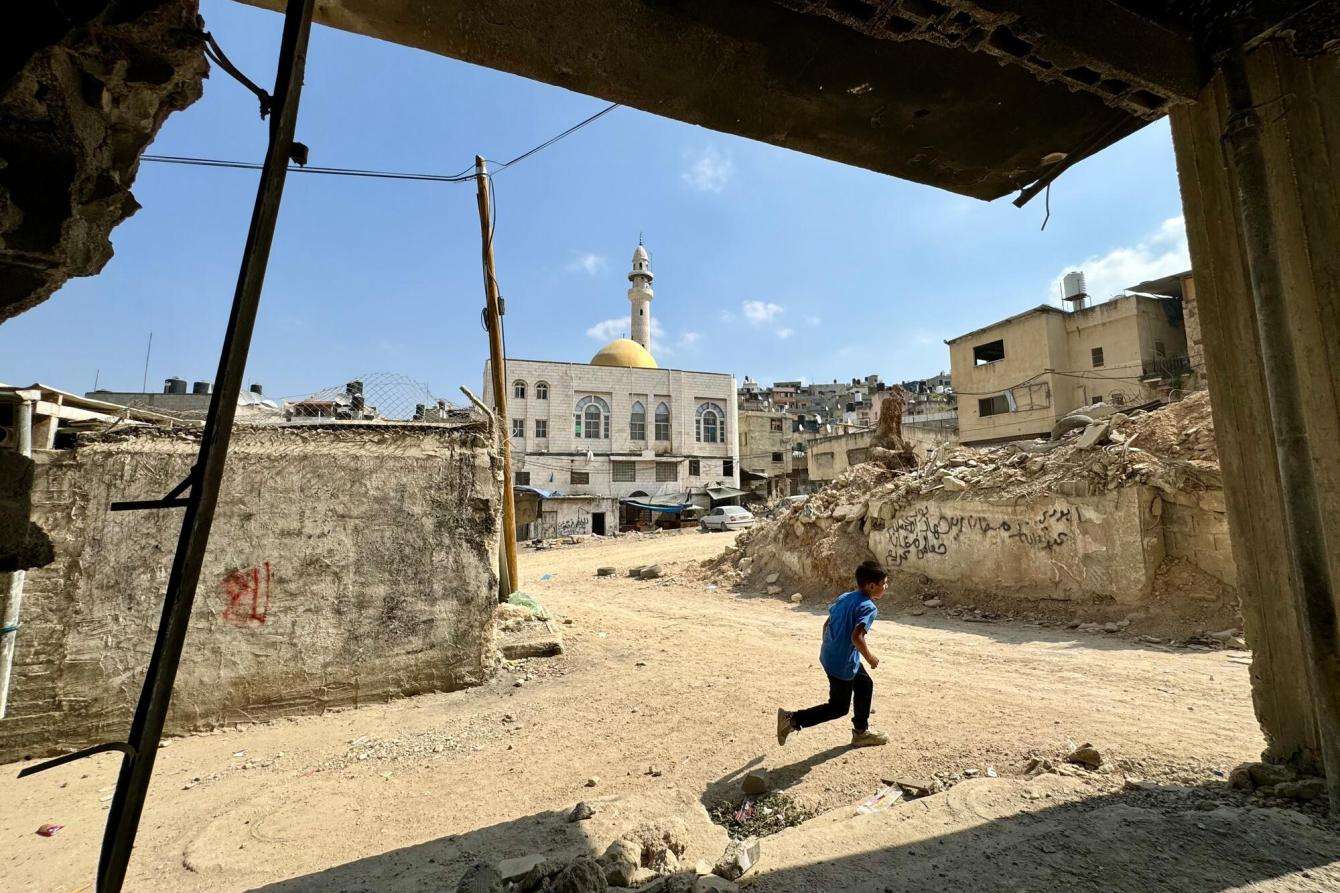 A child runs through Nur Shams refugee camp in Tulkarem.