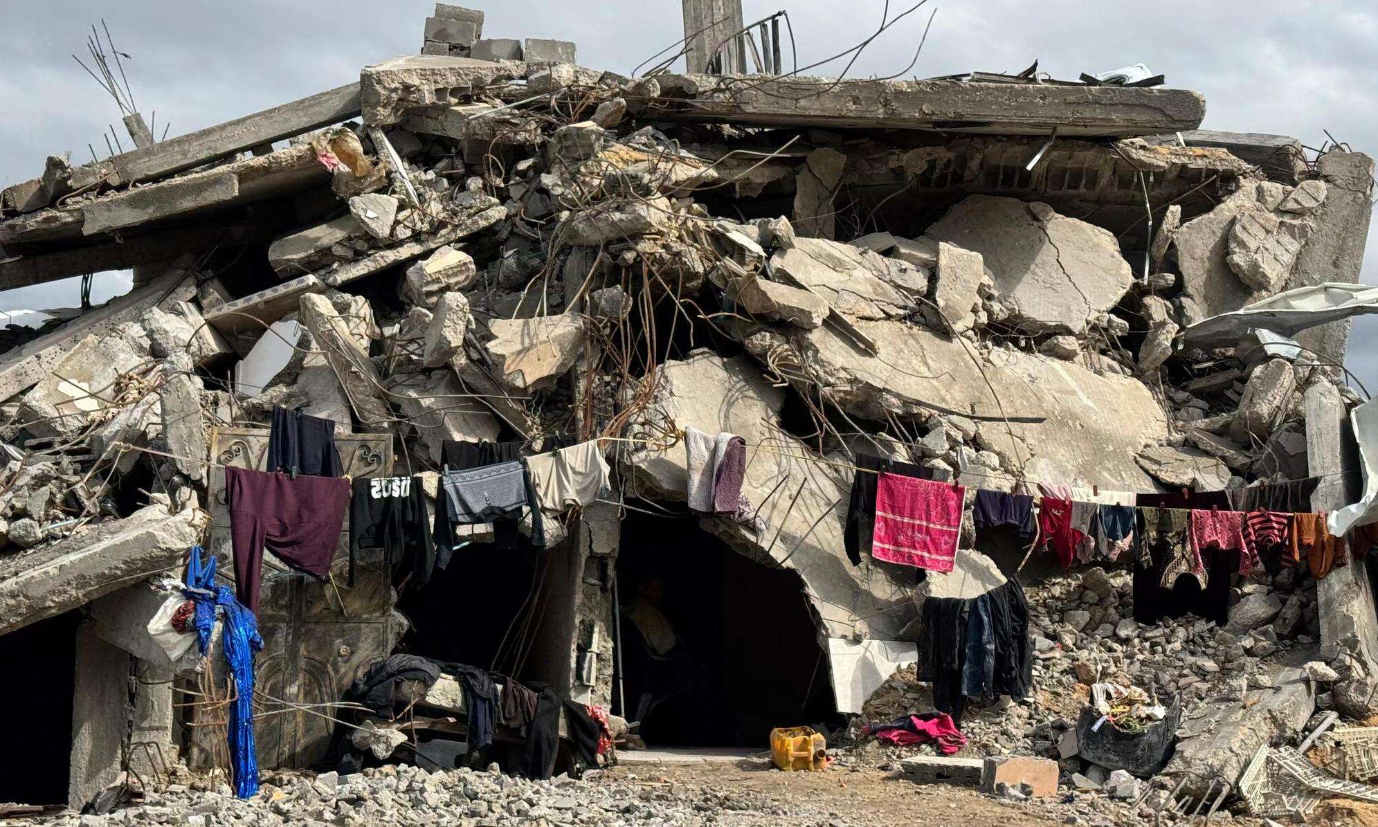 A Palestinian family's makeshift shelter built on the ruins of their destroyed home in Beit Lahia, northern Gaza.