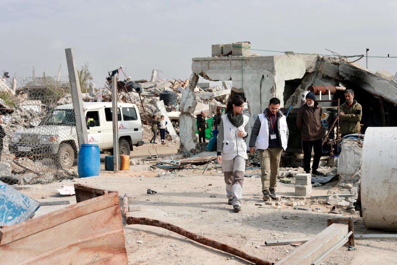 MSF staff assess a borehole in Gaza, Palestine.